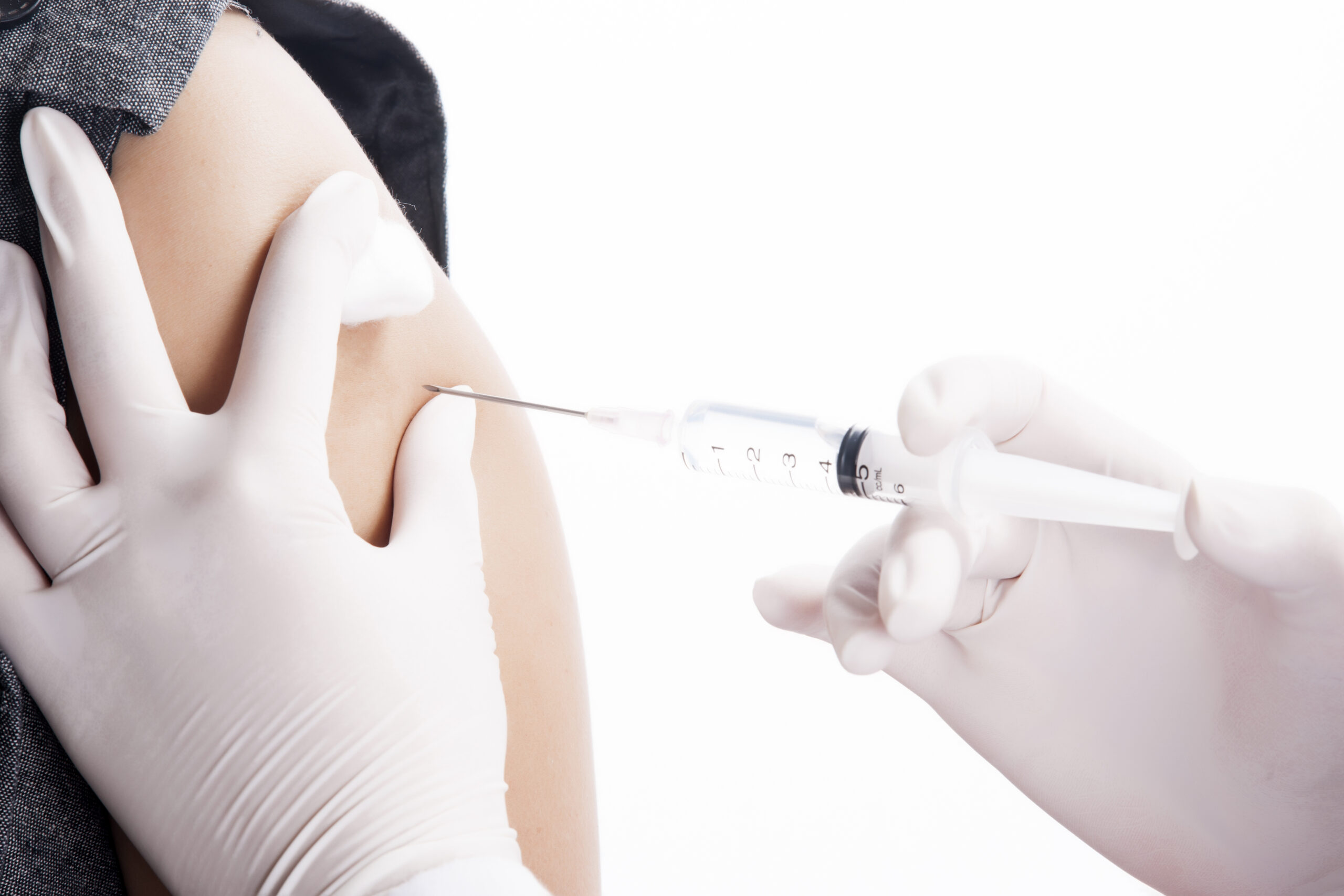 Doctor / Nurse holding a syringe give an injection akcja grypa